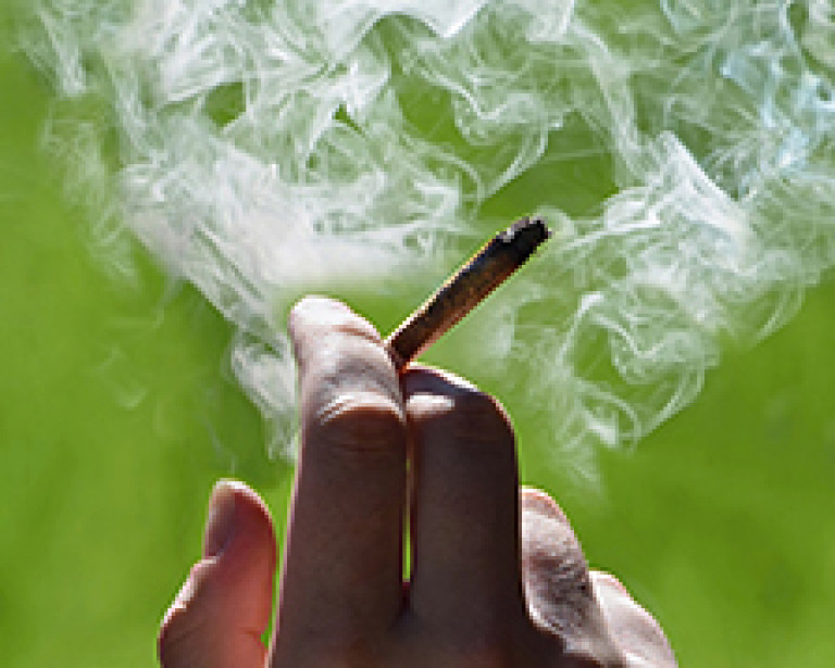 An image of a person smoking.