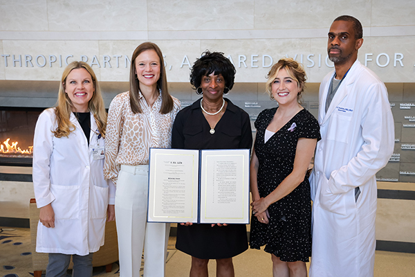 Left to right: Betsy Fricklas, PA, director of palliative care at the DCBSM; Carey Anders, MD, medical director of the DCBSM; Congresswoman Valerie Foushee; DCBSM patient Heather Gensler; and Rory Goodwin, MD, PhD, director of spine services for the DCBSM.